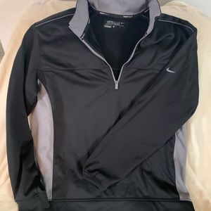 Men’s large Nike golf sweater. Great condition. Fleece lines.